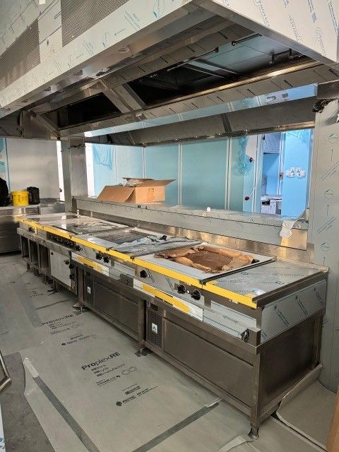 Commercial cooking line being installed in the main kitchen at the AFCB Performance Centre