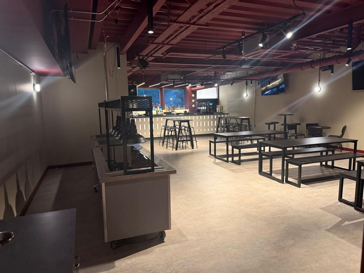 Hospitality lounge with servery and bench seating