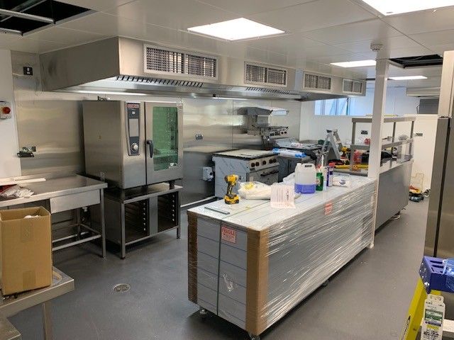 The new National Oceanography Centre kitchen with combi oven, cooking suite and servery